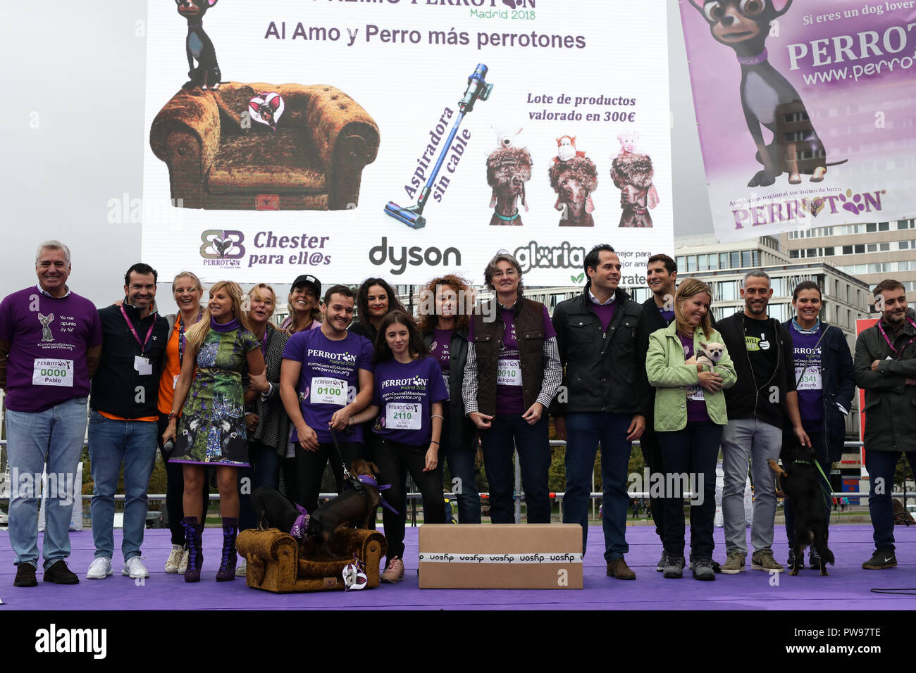 Madrid, Spain. 14th October 2018. Winners and representatives of the event. Perroton Madrid 2018 is the 7th edition of the solidarity race for the adoption and responsible holding of companion animals whose ambassador is the actress and singer Alejandra Botto on Oct 14, 2018 in Madrid, Spain Credit: Jesús Hellin/Alamy Live News Stock Photo