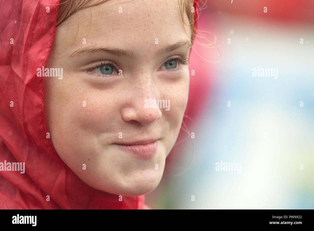 Look of satisfaction on the face of a wining contestant on a very rainy day at Southwick, East Midlands, England, 14th October 2018, for the 2018 junior world conker championships. Credit: Michael Foley/Alamy Live News Stock Photo