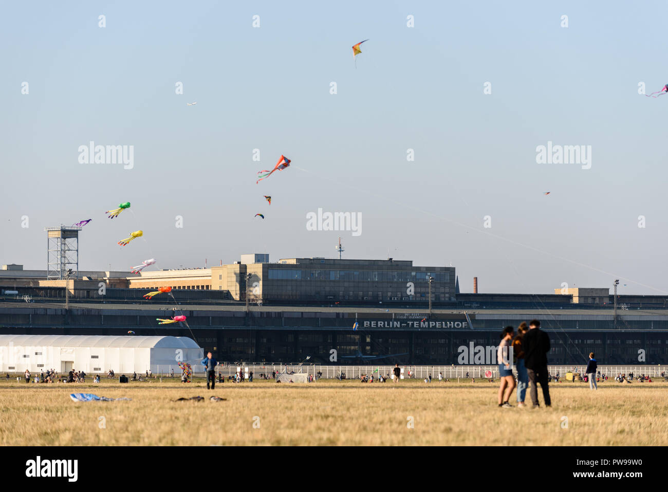 Berlin, Germany. 14th Oct, 2018. Visitors are seen on the Tempelhof field. The good weather in October brings many visitors to the park at the former Tempelhof Airport. Credit: Markus Heine/SOPA Images/ZUMA Wire/Alamy Live News Stock Photo