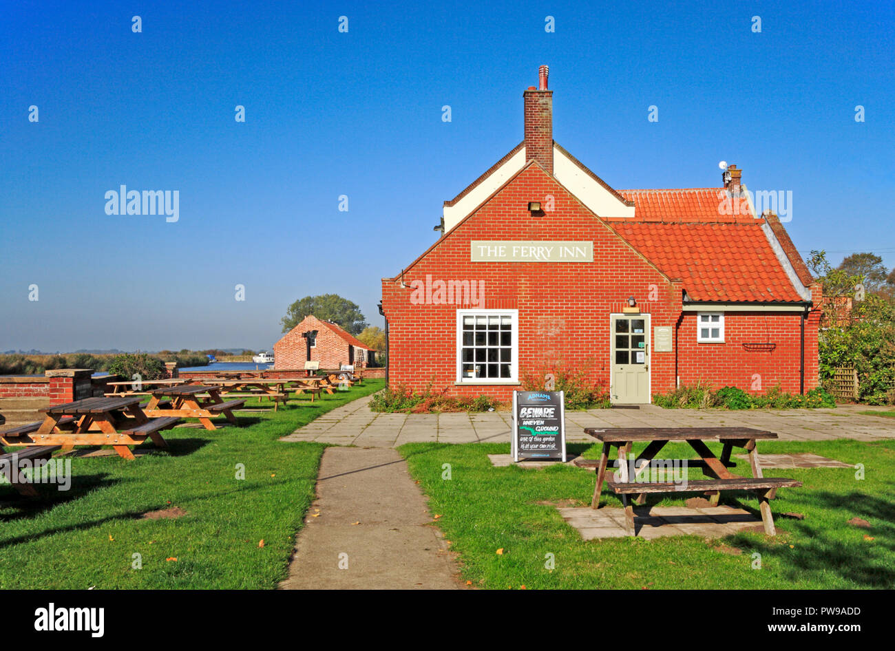 A view of The Ferry Inn by the River Bure on the Norfolk Broads at Stokesby, Norfolk, England, United Kingdom, Europe. Stock Photo