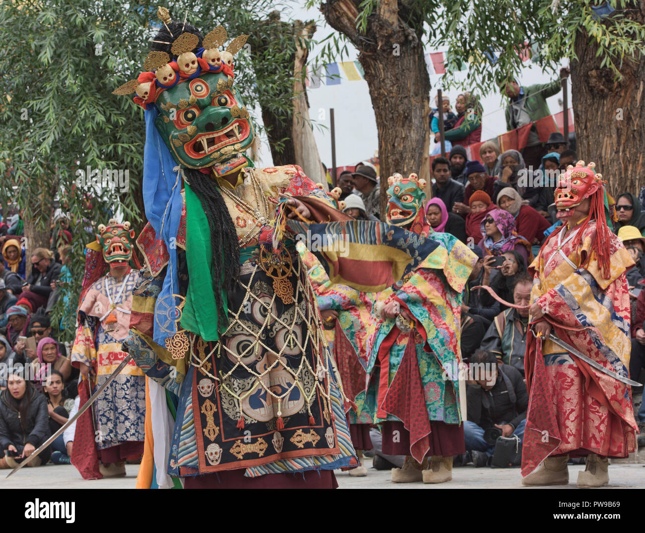 Masked monks performing at a traditional cham dance, Leh, Ladakh, India Stock Photo