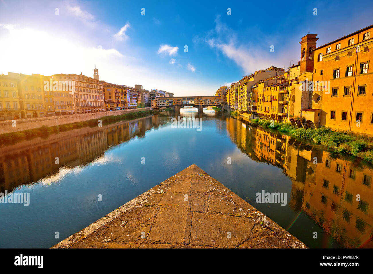 Ponte Vecchio bridge and Florence waterfront sunrise view, Tuscany region of Italy Stock Photo