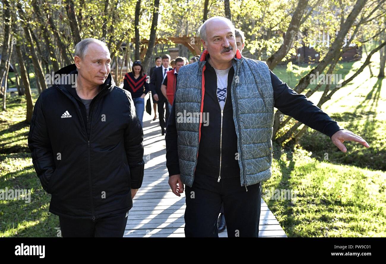 Russian President Vladimir Putin, left, is given a tour of the Alexandria agricultural community by Belarus President Alexander Lukashenko October 12, 2018 n Sokolowski District, Belarus. Lukashenko was born and raised in the community. Stock Photo