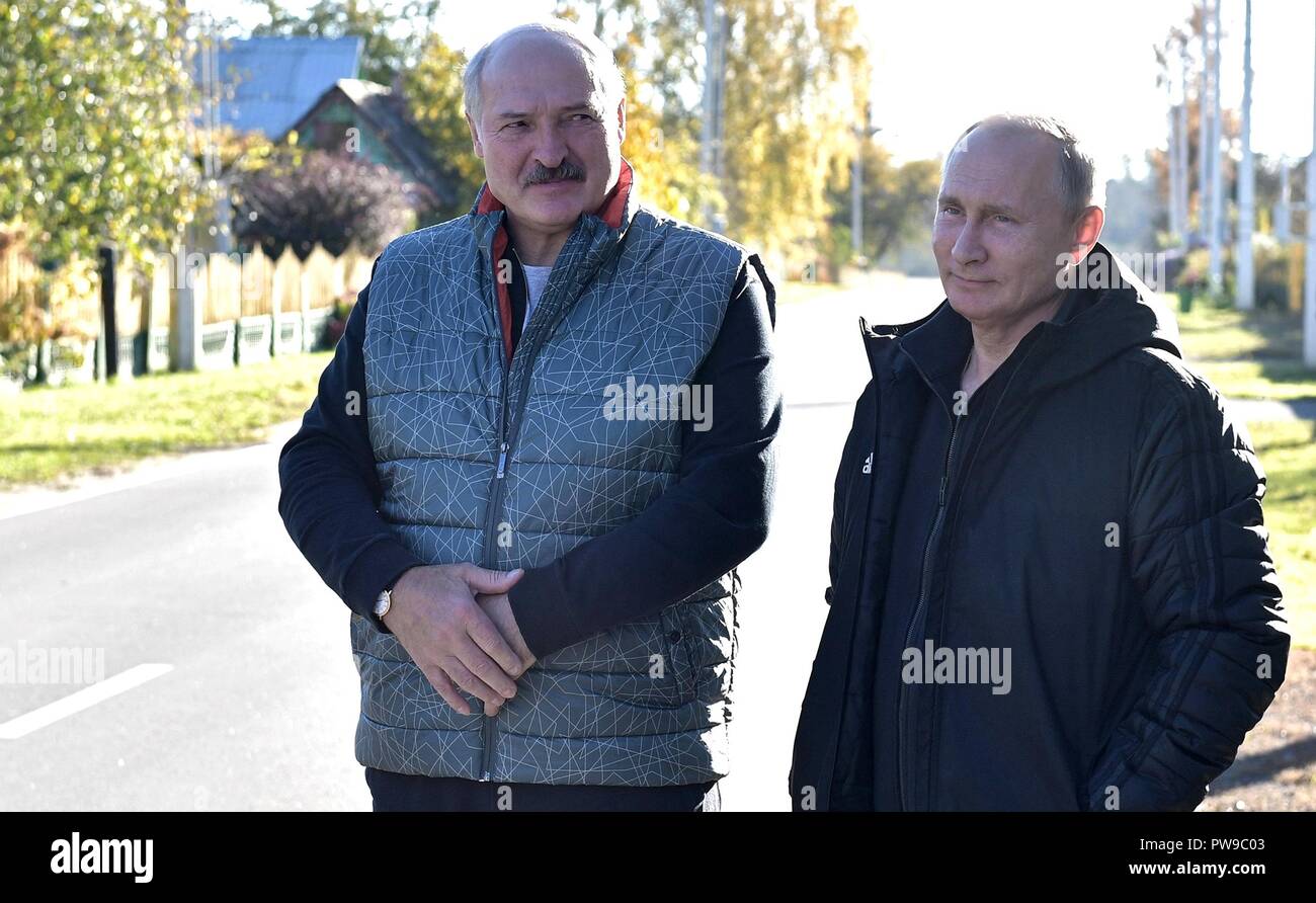 Russian President Vladimir Putin, right, is given a tour of the Alexandria agricultural community by Belarus President Alexander Lukashenko October 12, 2018 n Sokolowski District, Belarus. Lukashenko was born and raised in the community. Stock Photo