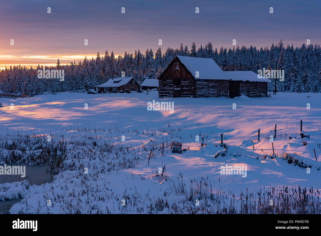 Winter sunset, Farm, 83 Mile House, Cariboo Region, British Columbia, Canada Stock Photo
