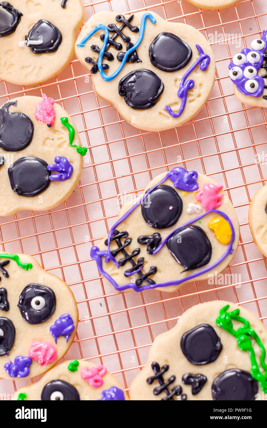 Decorating Sugar Cookies With Royal Icing For Dia De Los Muertos