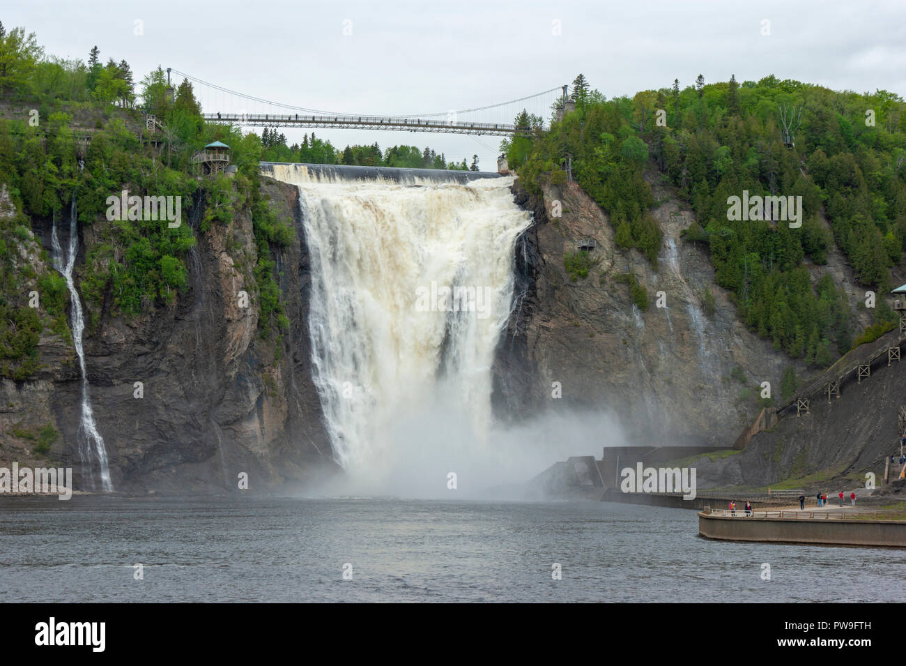 The cascading waters of the Montmorency Falls plunging down a precipice