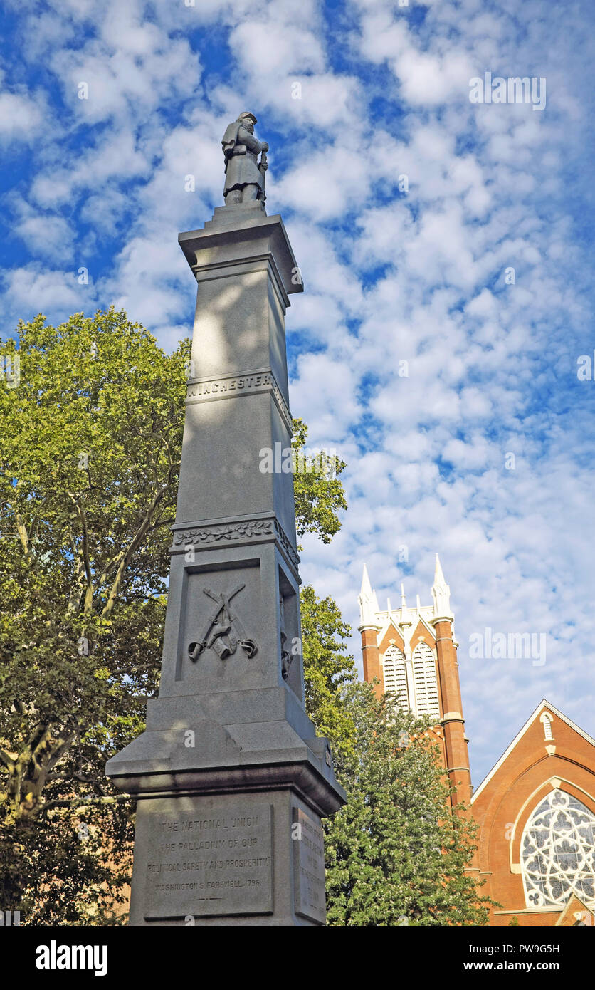 Downtown Painesville, Ohio in Lake County is known for its Civil War monument in Veterans Park and the gothic United Methodist Church on the square. Stock Photo