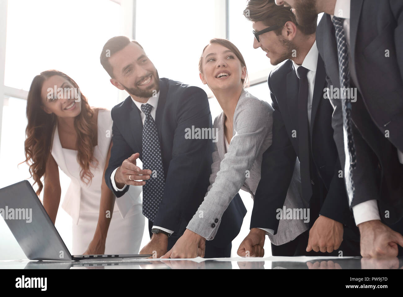 business team standing near the office Desk Stock Photo - Alamy