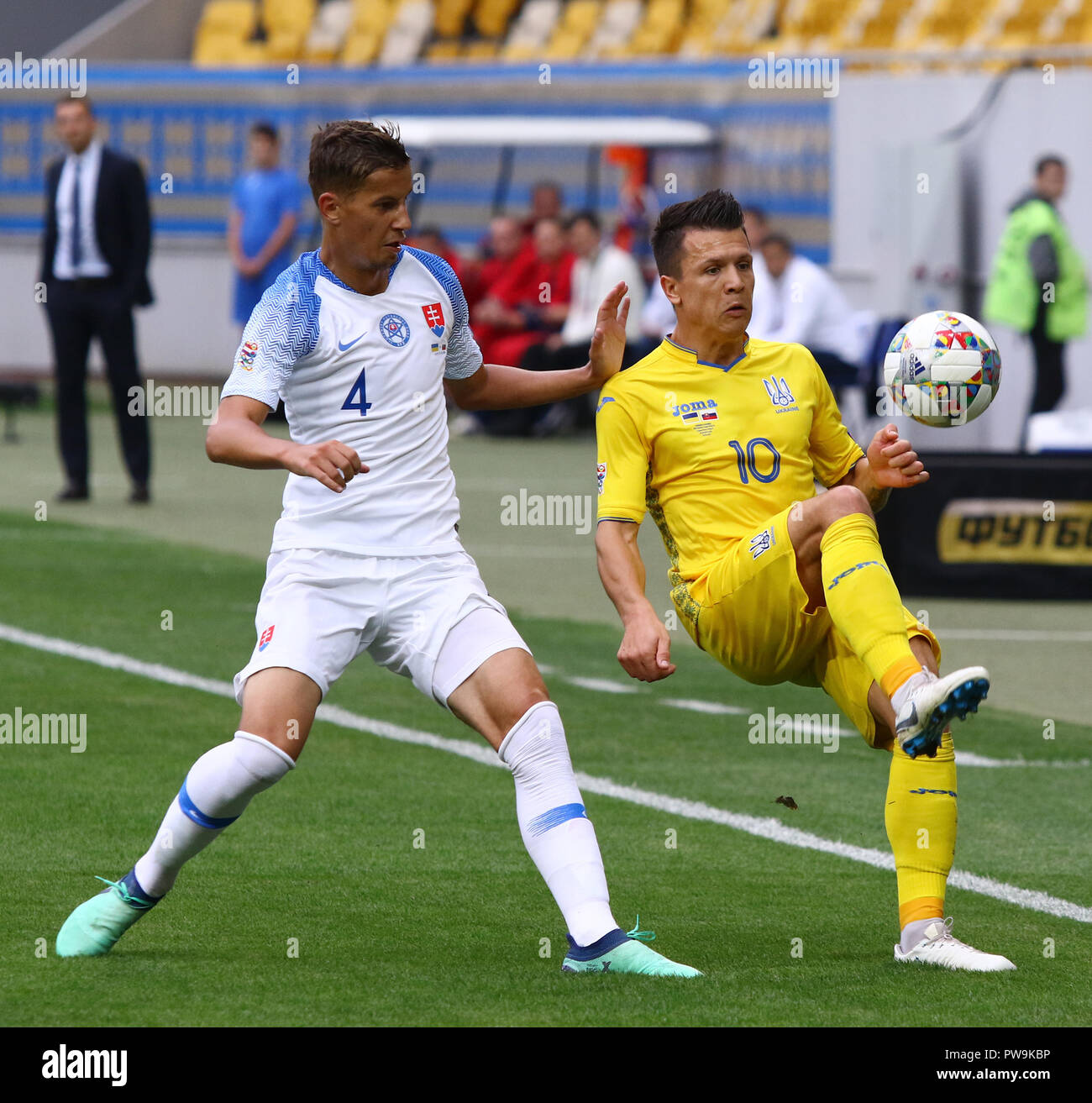 LVIV, UKRAINE - SEPTEMBER 9, 2018: Lubomir Satka of Slovakia (L) fights for a ball with Yevhen Konoplyanka of Ukraine during their UEFA Nations League Stock Photo