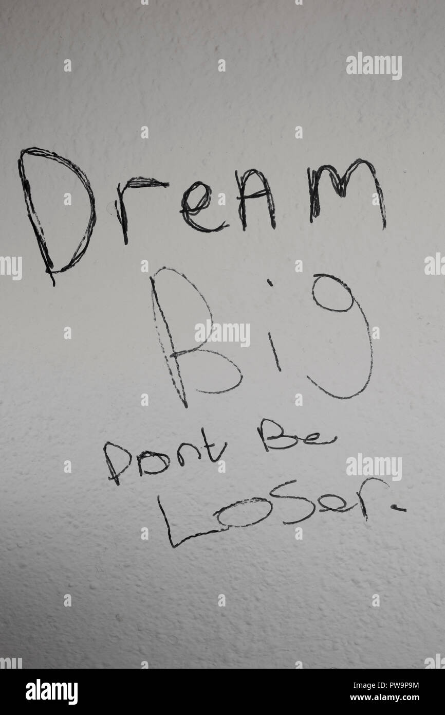 Dream Big dont be Loser drawn in a bustop in Morecambe Lancashire England UK GB Stock Photo