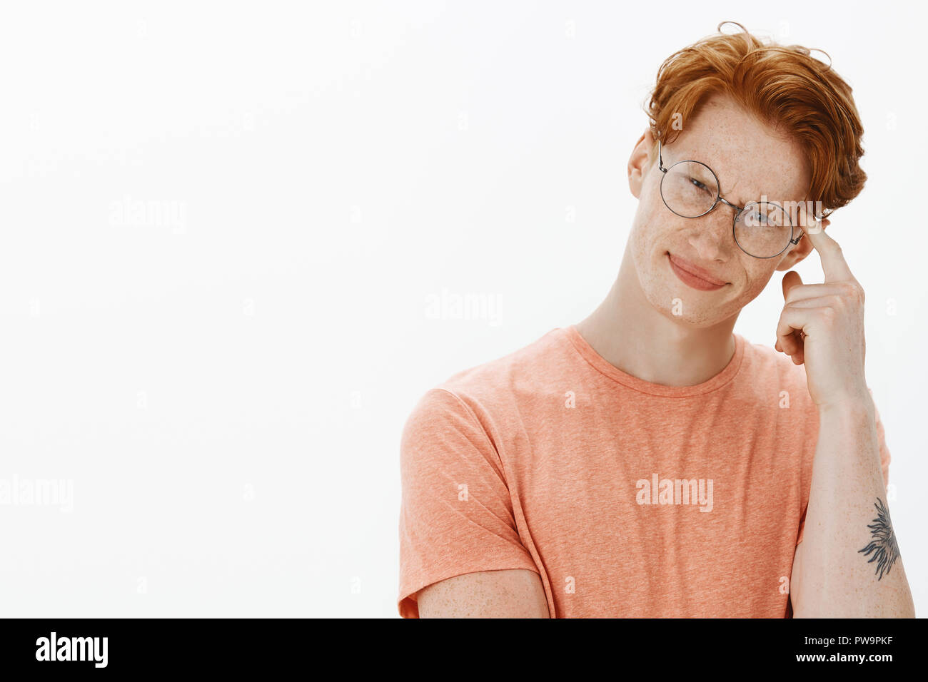 Creative And Smart Redhead Man With Stylish Hairstyle And Freckles