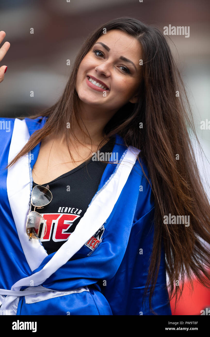 Chicago, Illinois , USA - September 9, 2018 The 26th Street Mexican Independence Parade, young woman on top of a float promoting the beer brand Tecate Stock Photo