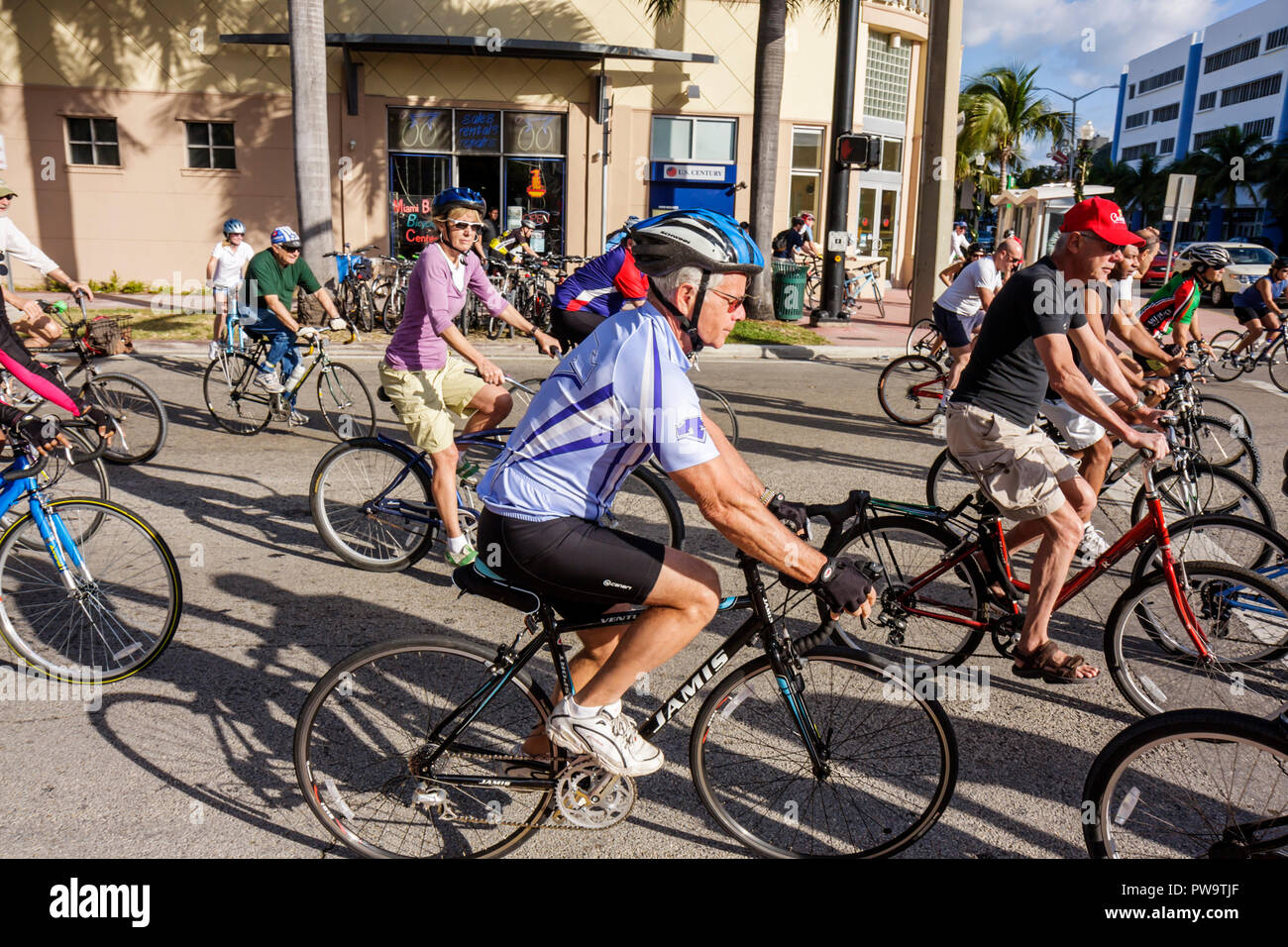 Miami Beach Florida,5th Fifth Street,group,bicycle,bicycling,riding,biking,rider,cycling,man men male adult adults,men,adult adults woman women female Stock Photo