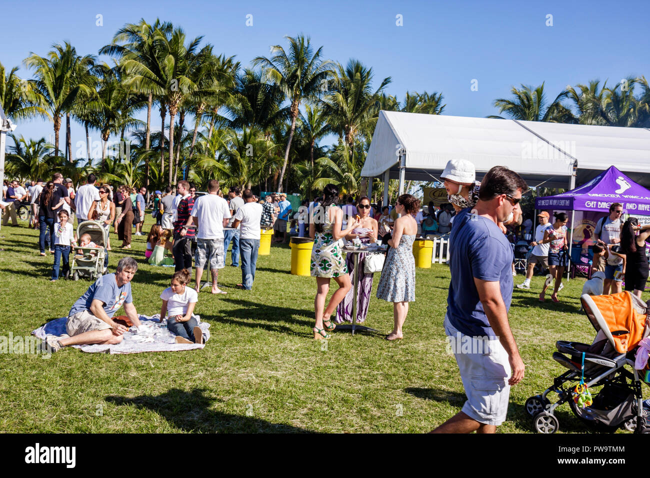Miami Florida,Coconut Grove,Peacock Park,Great Taste of the Grove,community food Festival,festivals fair,taste,tasting,Hispanic men,women,singles,fami Stock Photo