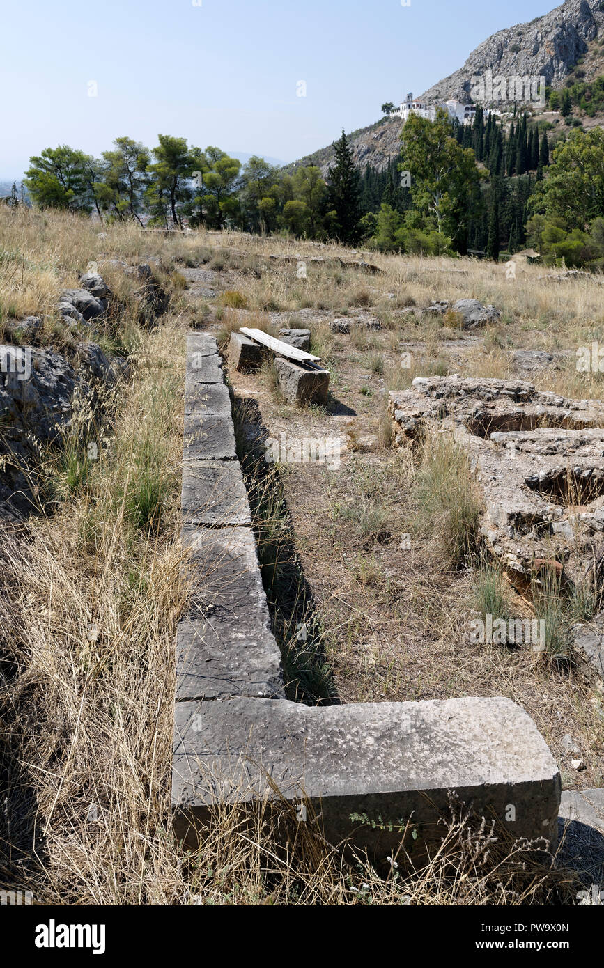 Foundations of a building, Sanctuaries of Apollo Deiradiotes or Pythios and Athena Oxyderkes. Argos, Peloponnese, Greece. Most of the surviving struct Stock Photo