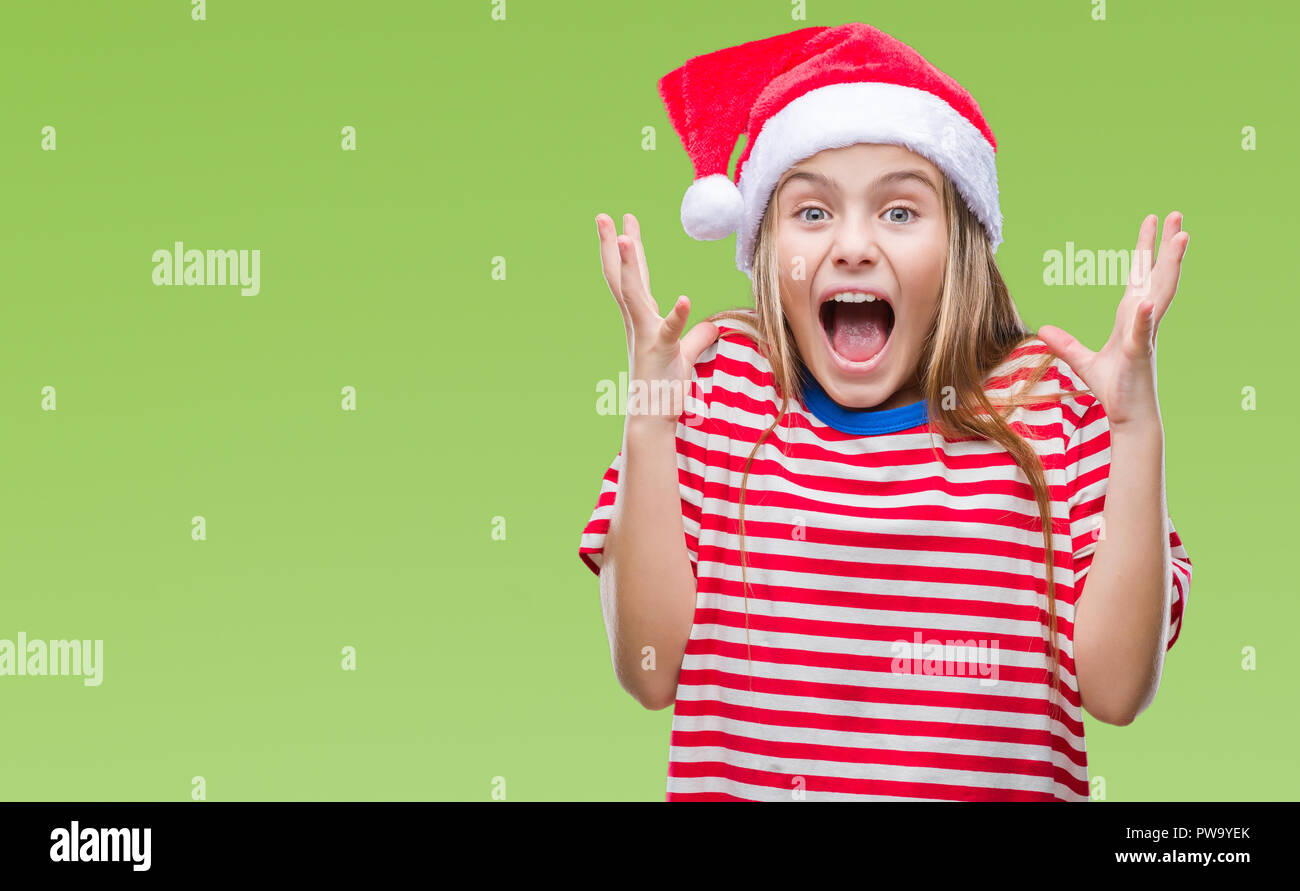 Young Beautiful Girl Wearing Christmas Hat Over Isolated Background