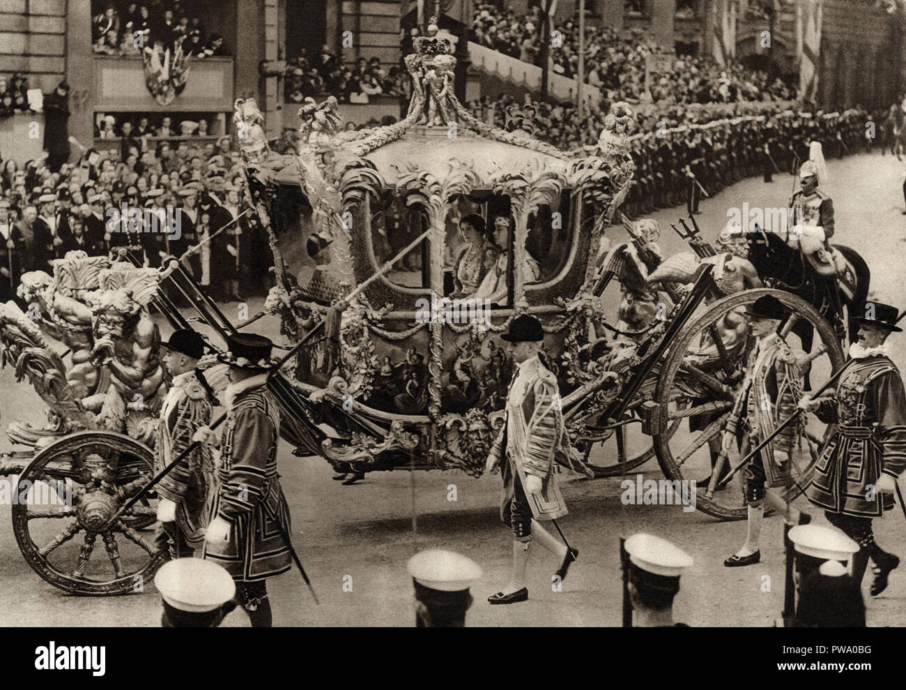 The coronation of George the sixth on May 12 1937 showing the king and queen in the Gold State Coach published in a souvenir book dated 1937 Stock Photo