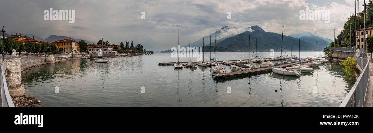Boats in the harbour at Dongo on Lake Como, Italy on a cloudy day Stock Photo