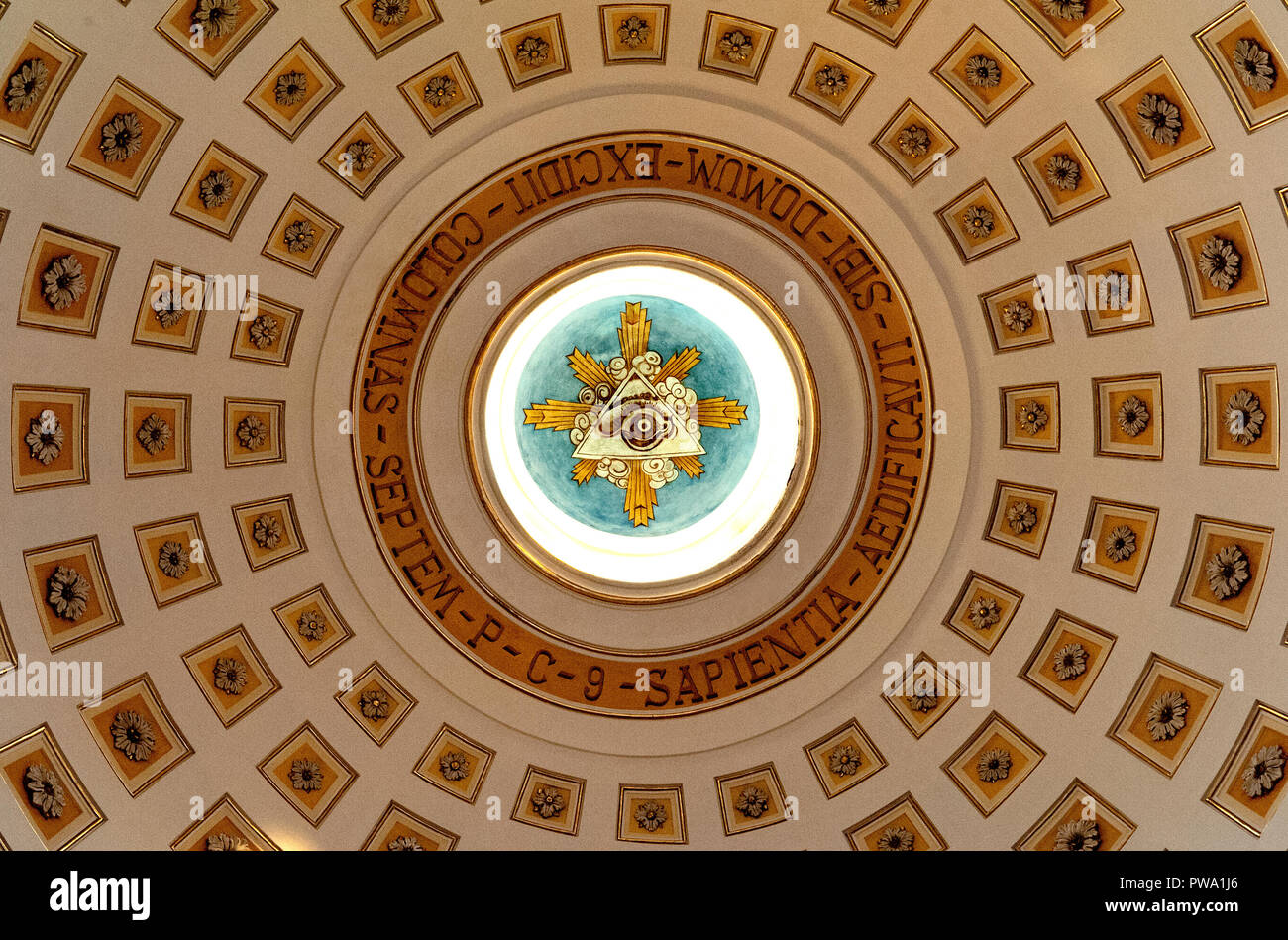 The 'All Seeing Eye' or 'Eye of Providence', a symbol of the Christian Trinity, in the dome ofthe Mother Church of Saint George in Locorotondo, Italy. Stock Photo