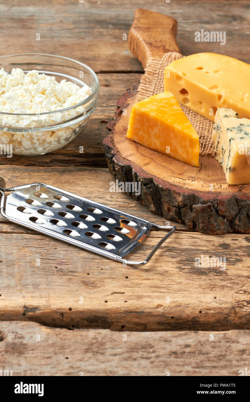 Variety Of Cheese On Wooden Background Cottage Cheese And Hard