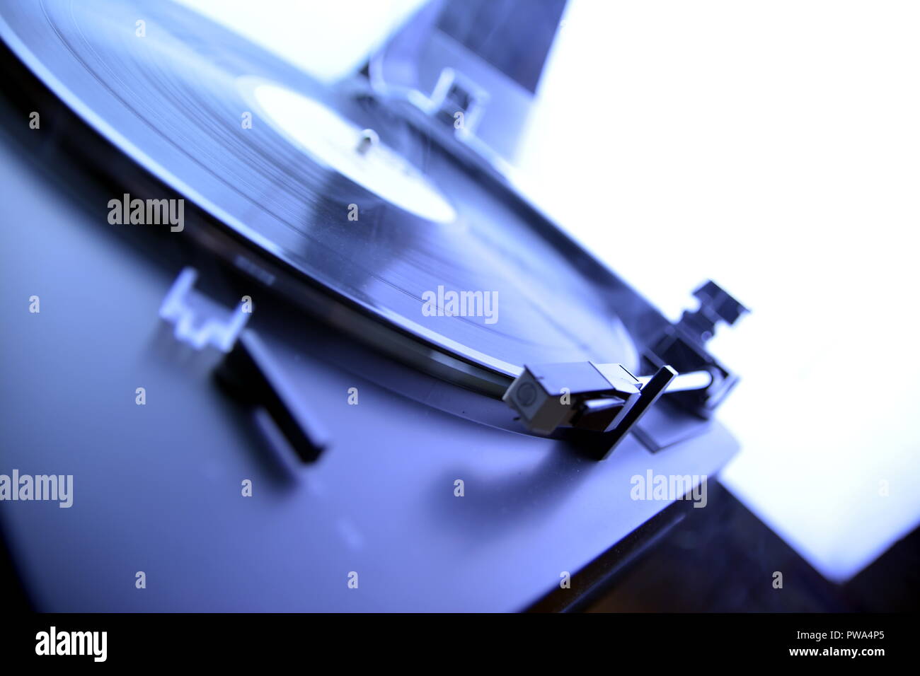Turntable vinyl record player is playing music Stock Photo - Alamy