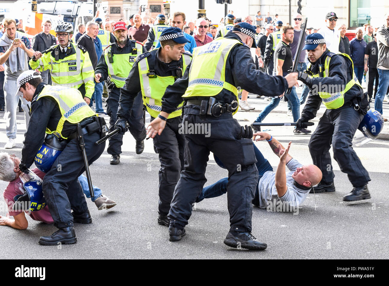 Democratic Football Lads Alliance DFLA members broke through police cordons during a protest march and fought with police. Police batons ready Stock Photo