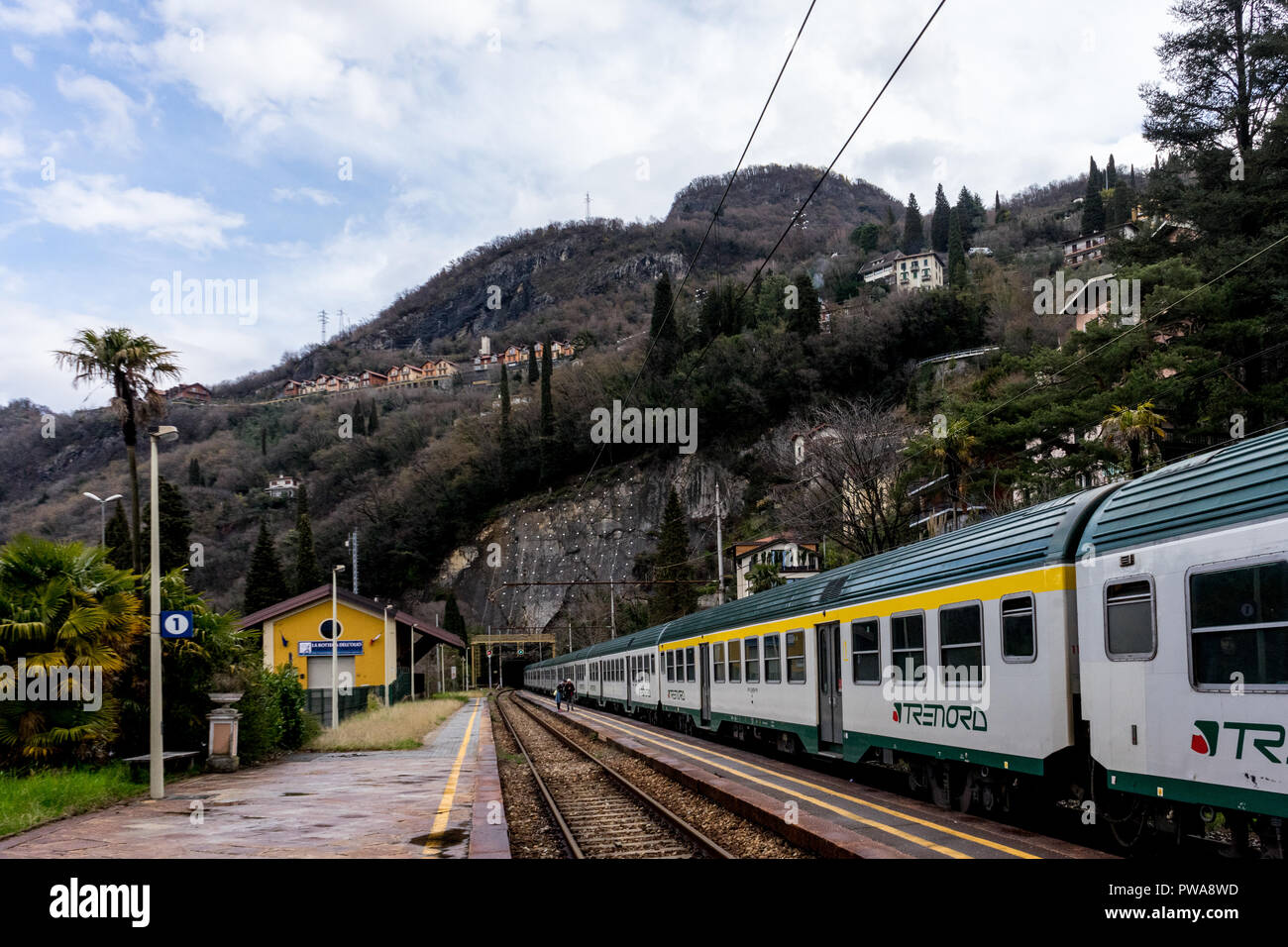 Varenna, Italy March 31, 2018 Treinitalia Trenord train at Varenna