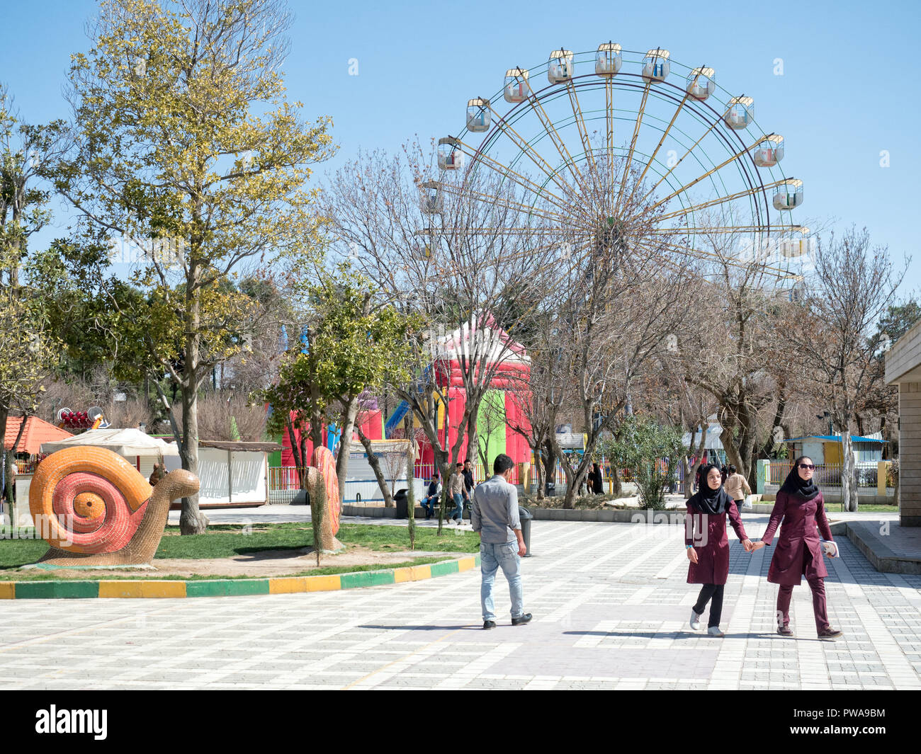 Shiraz, Iran - March 1, 2017 : Azadi Amusement Park is a popular attraction for locals and tourists Stock Photo