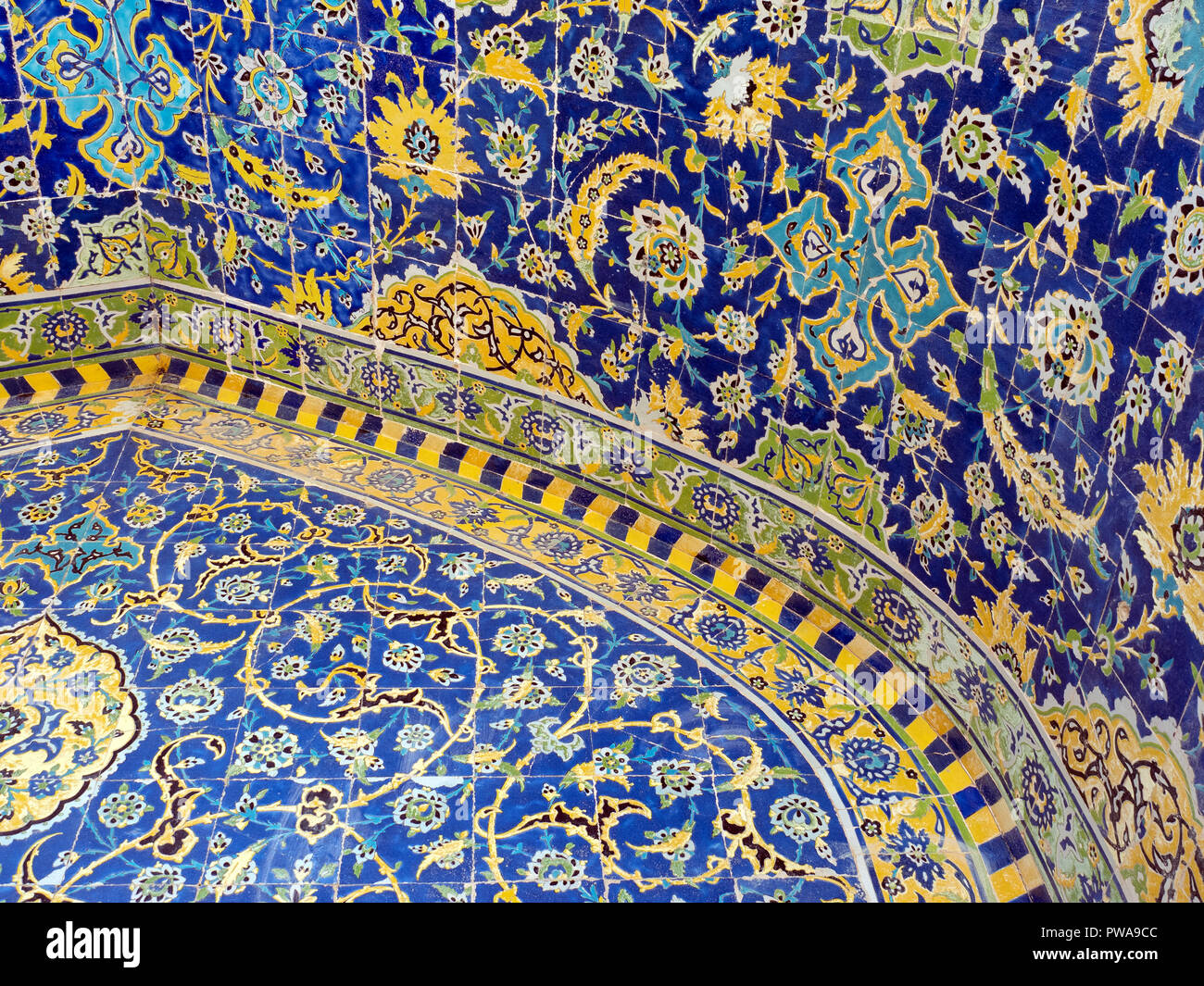 Polychrome tile decoration in Shah mosque, Isfahan, Iran Stock Photo