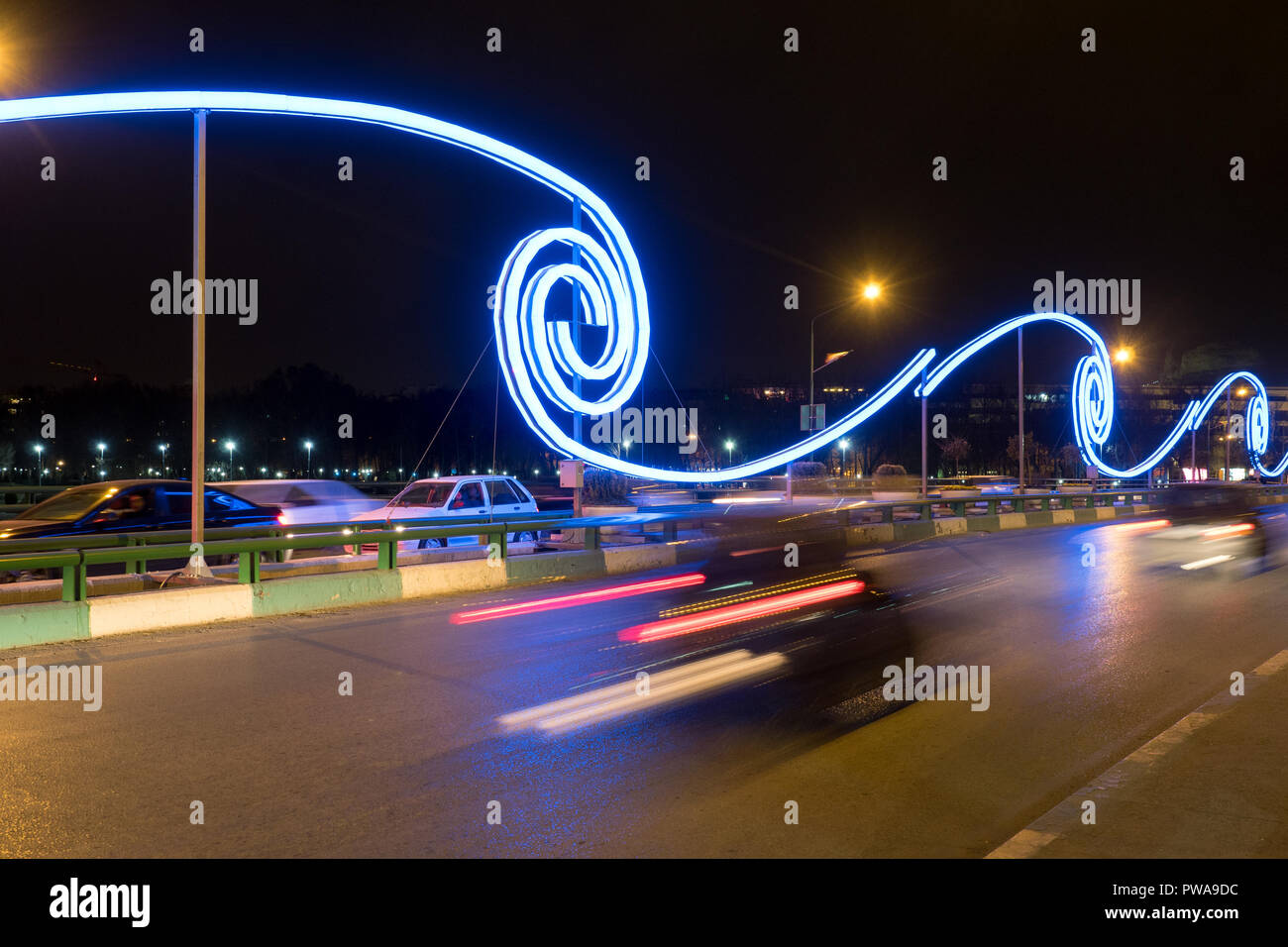 Night long exposure : tail lights on a bridge over Zayandeh river, Isfahan, Iran Stock Photo