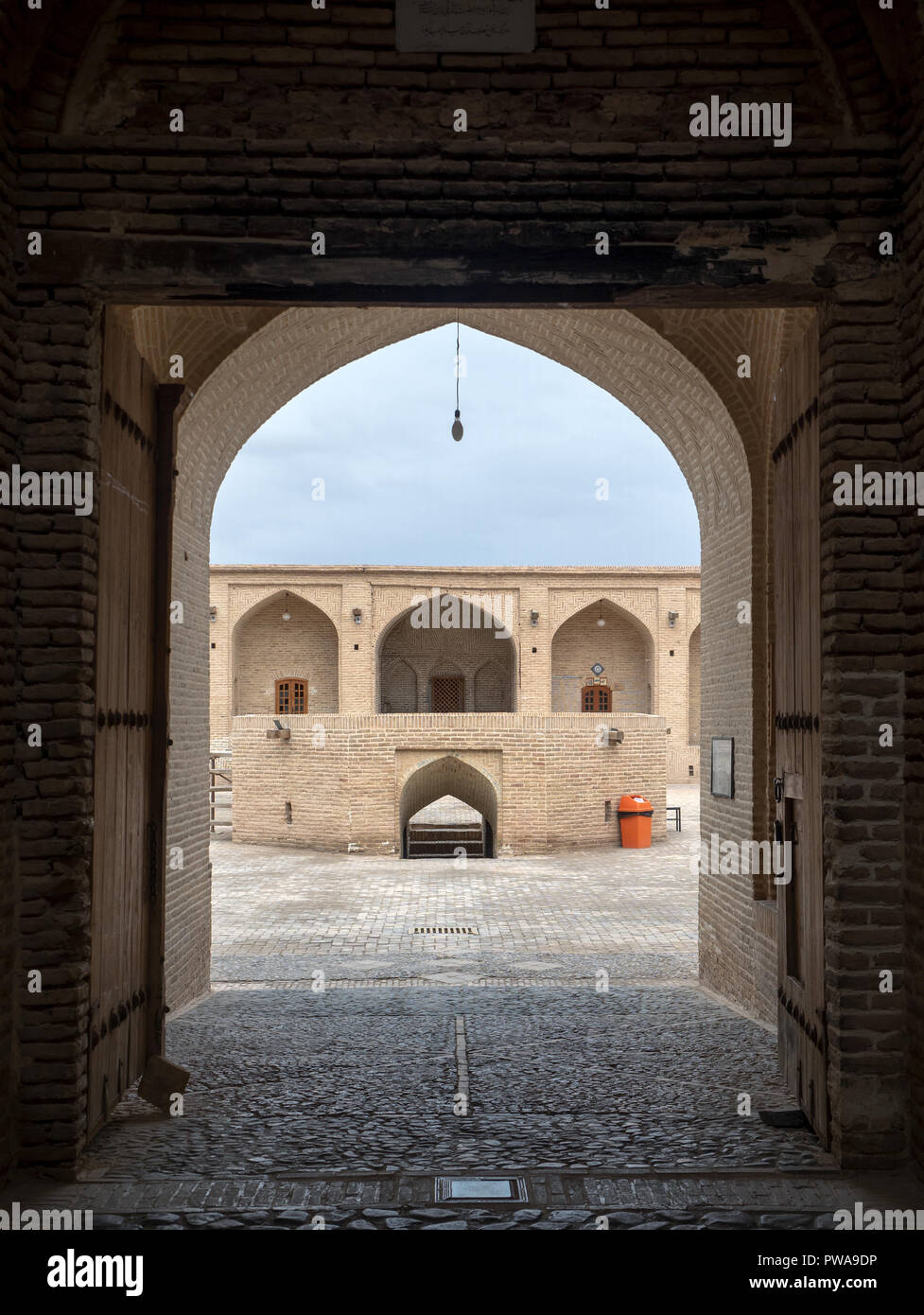 Entrance gate to Shah Abbasi Caravanserai, Meybod, Iran Stock Photo