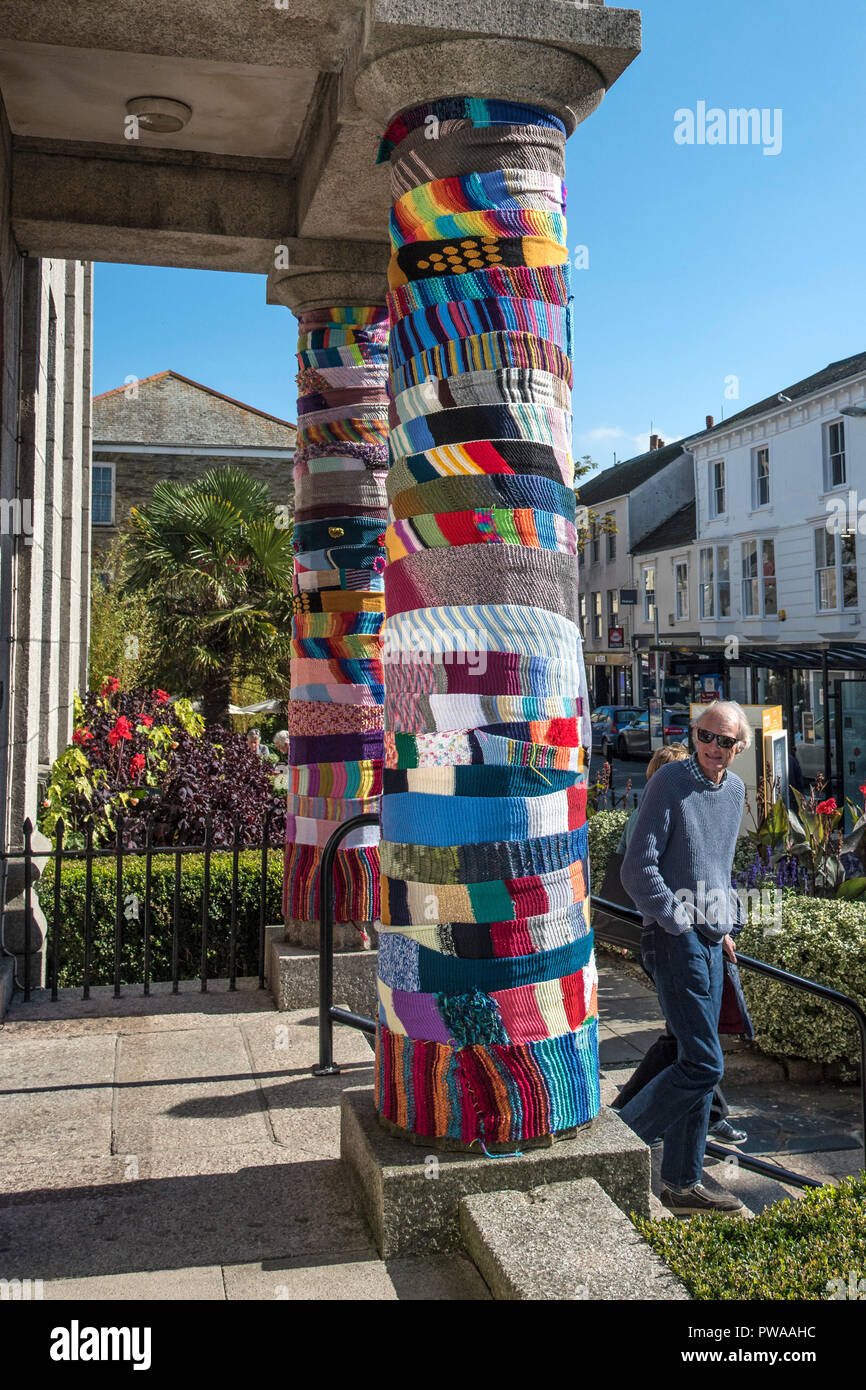 Yarn bombing on the pillars at the entrance to Truro Museum in Cornwall in the UK. Stock Photo