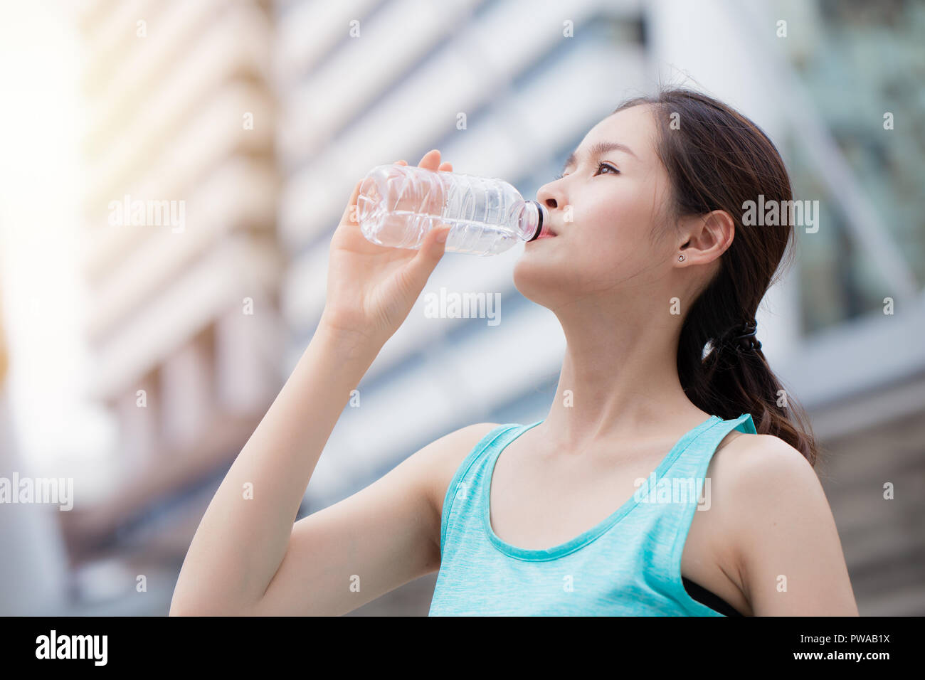 Teenage girl water bottle hi-res stock photography and images - Alamy