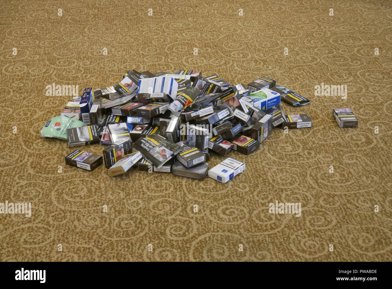 tobacco products delivery A pile of discarded nicotine delivery systems including tobacco products  and Nicotine Replacement products Stock Photo