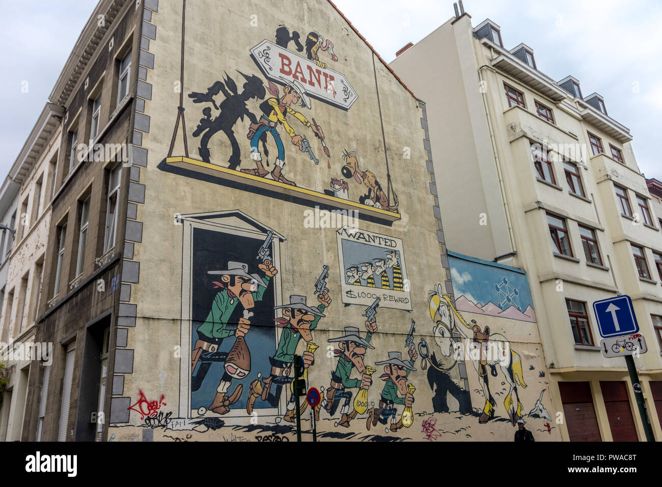 Brussels, Belgium - April 17 :  A fresco of an bank robbery on the walls of a building at Brussels, Belgium, Europe on april 17. Stock Photo