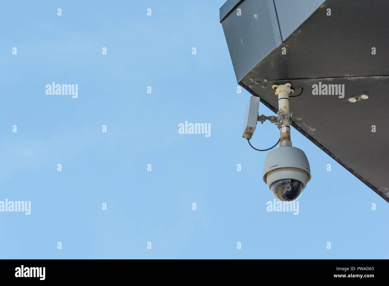 CCTV surveillance camera 'Watching Over You'. Crime prevention metaphor