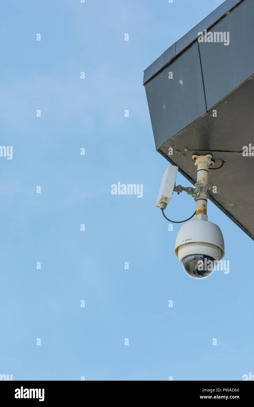 CCTV surveillance camera 'Watching Over You'. Crime prevention metaphor