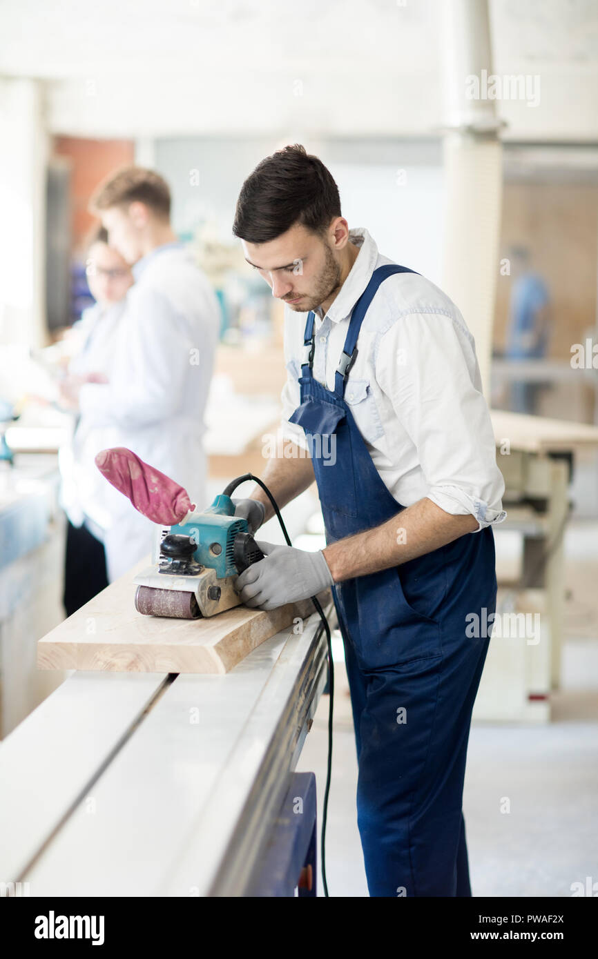 Adult using electric sander hi-res stock photography and images - Alamy