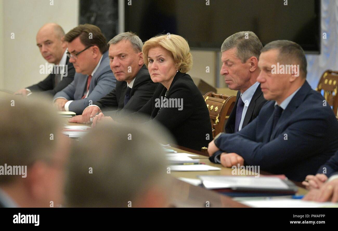 Russian government officials during a meeting of government members at the Kremlin October 11, 2018 in Moscow, Russia. Seated left to right: Finance Minister Anton Siluanov, Chief of the Government Staff Konstantin Chuychenko, Deputy Prime Ministers Yury Borisov, Olga Golodets and Dmitry Kozak, Far Eastern Envoy Yury Trutnev. Stock Photo