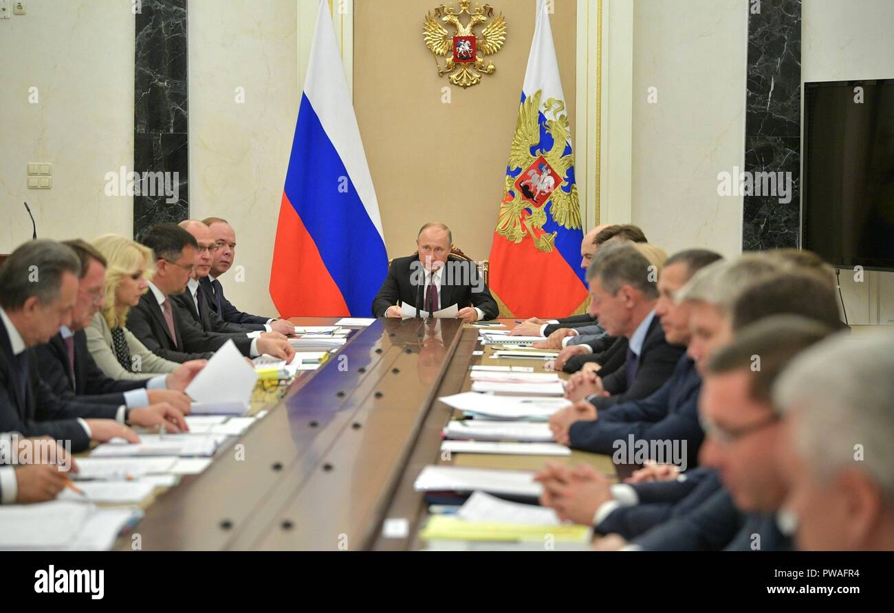 Russian President Vladimir Putin chairs a meeting of government members at the Kremlin October 11, 2018 in Moscow, Russia. Stock Photo