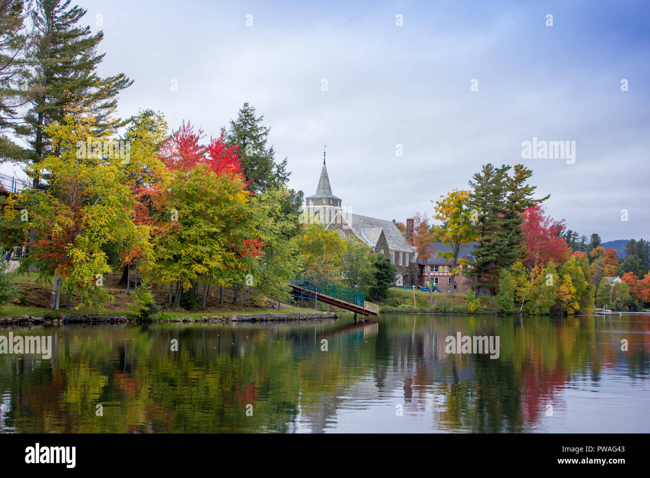 A view of the brilliant and eclectic colors that take over the entire Adirondacks region in New York state of USA during the peak fall season Stock Photo