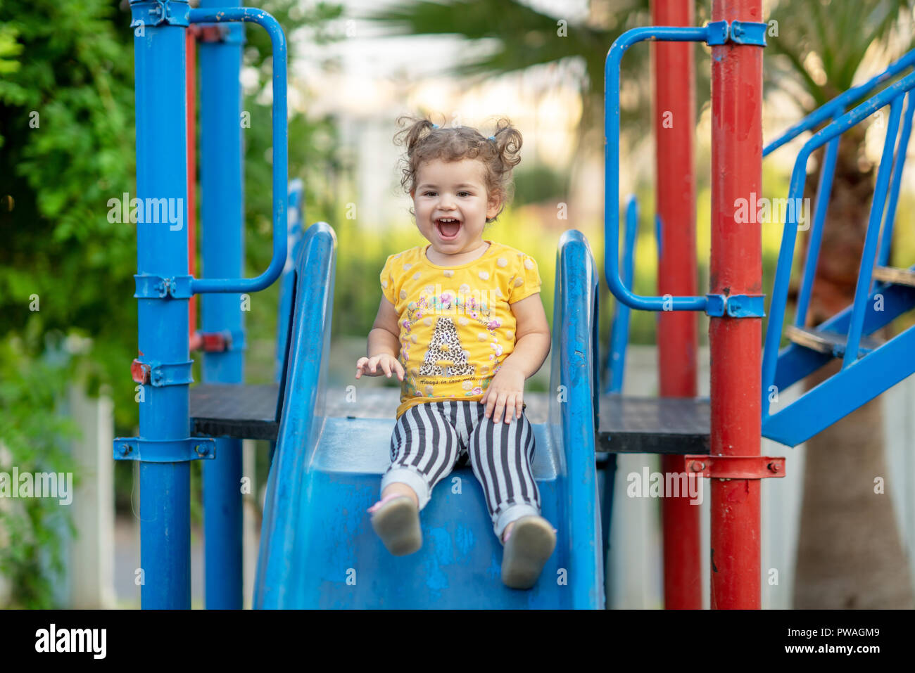 Little Toddler Playing At Playground Outdoors In Summer Stock Photo Alamy
