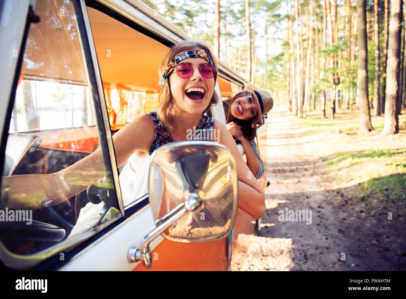 Hipster friends on road trip on a summers day Stock Photo