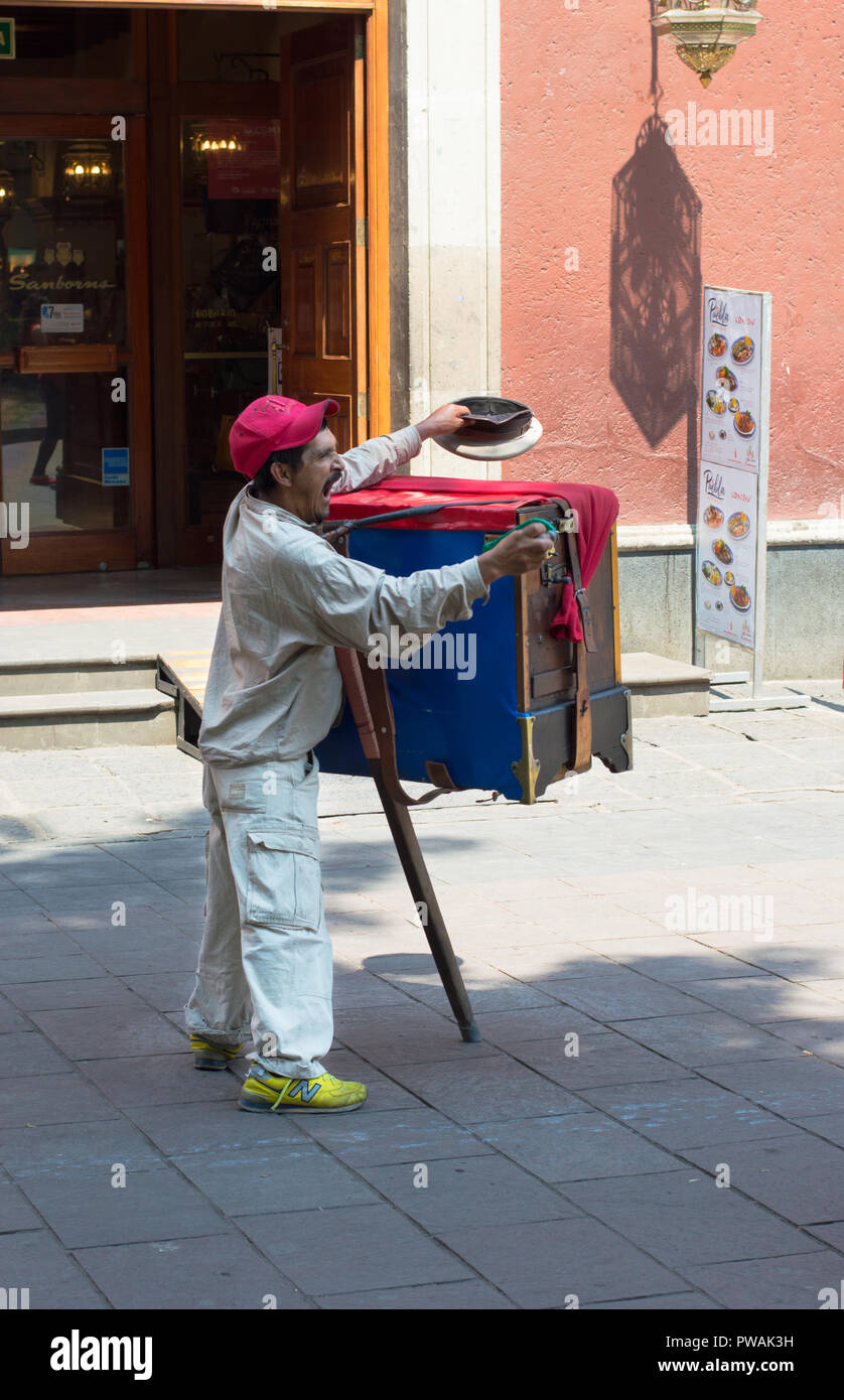 Man and street organ in Coyoacan, Mexico City. Stock Photo