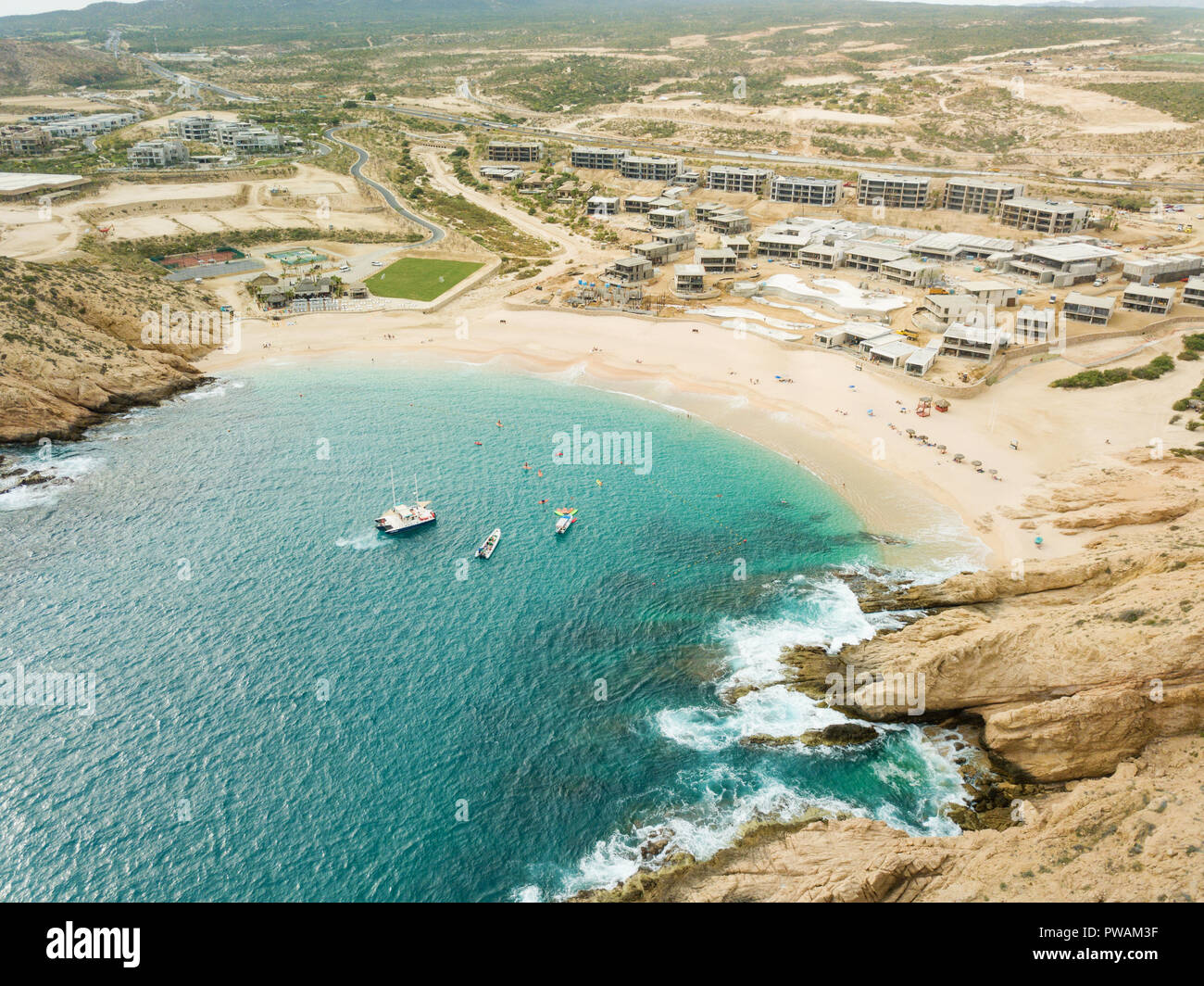 Boats and beachgoers visit Santa Maria Bay near Cabo San Lucas, Mexico. Stock Photo