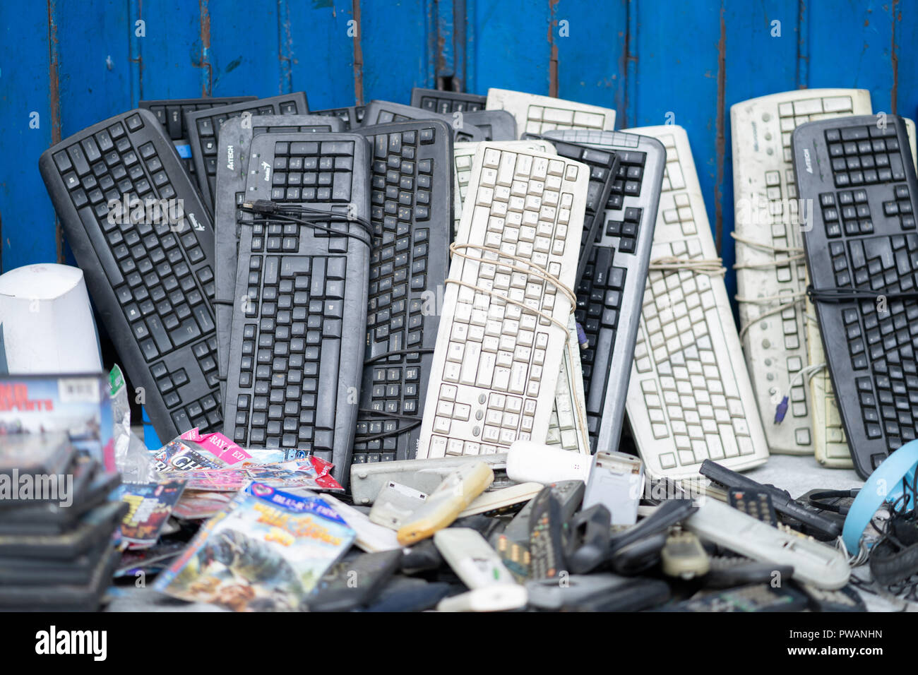 Old electronic keyboards for sale on a sidewalk,Cebu City,Phiulippines Stock Photo