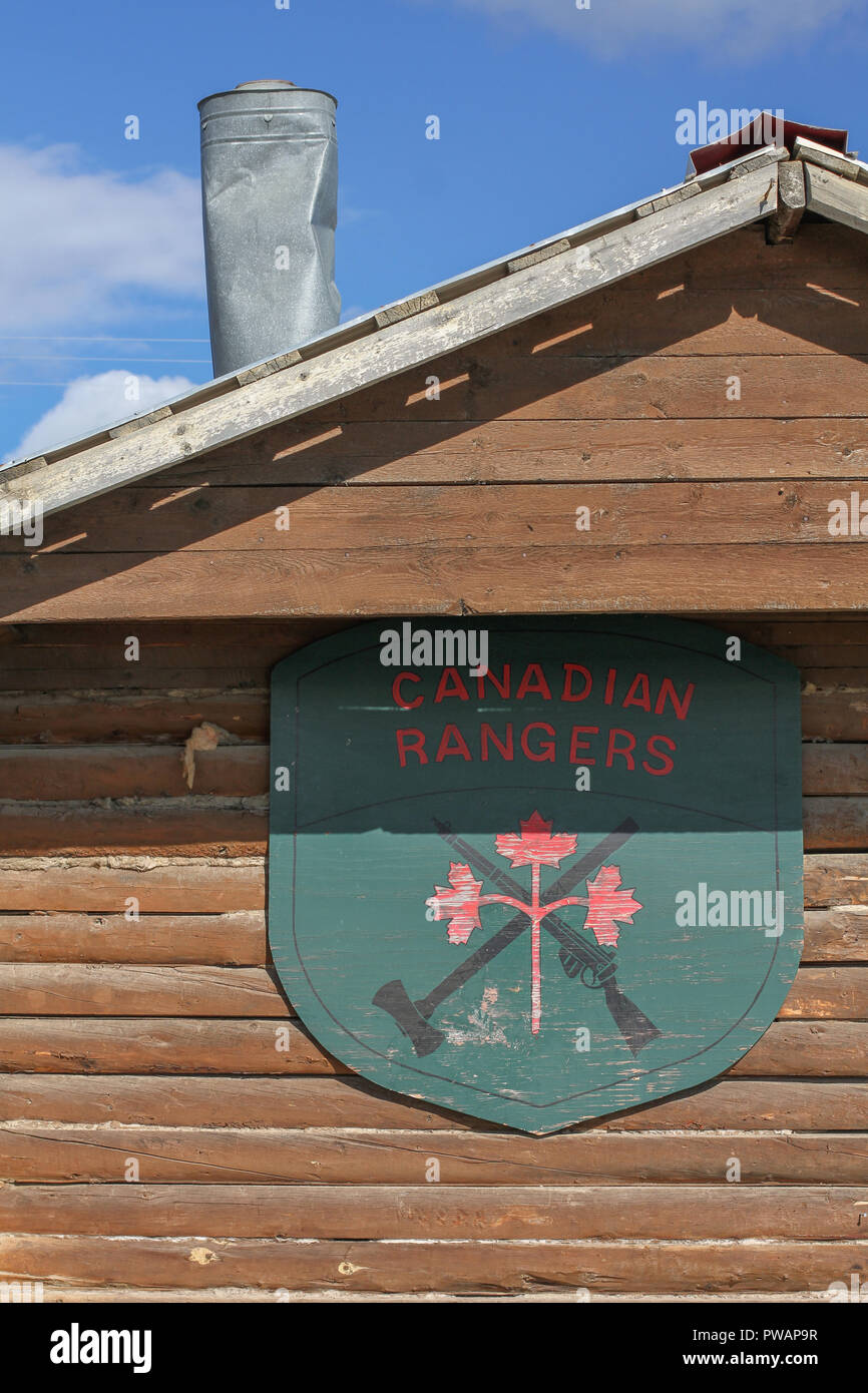 Old Crow, Canada. Detail of the emblem of the Canadian Rangers at historical cabin. Stock Photo