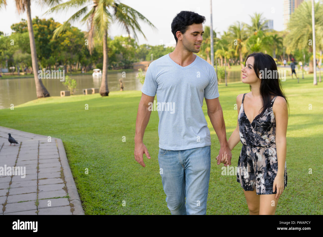 Hispanic couple holding hands hi-res stock photography and images - Alamy