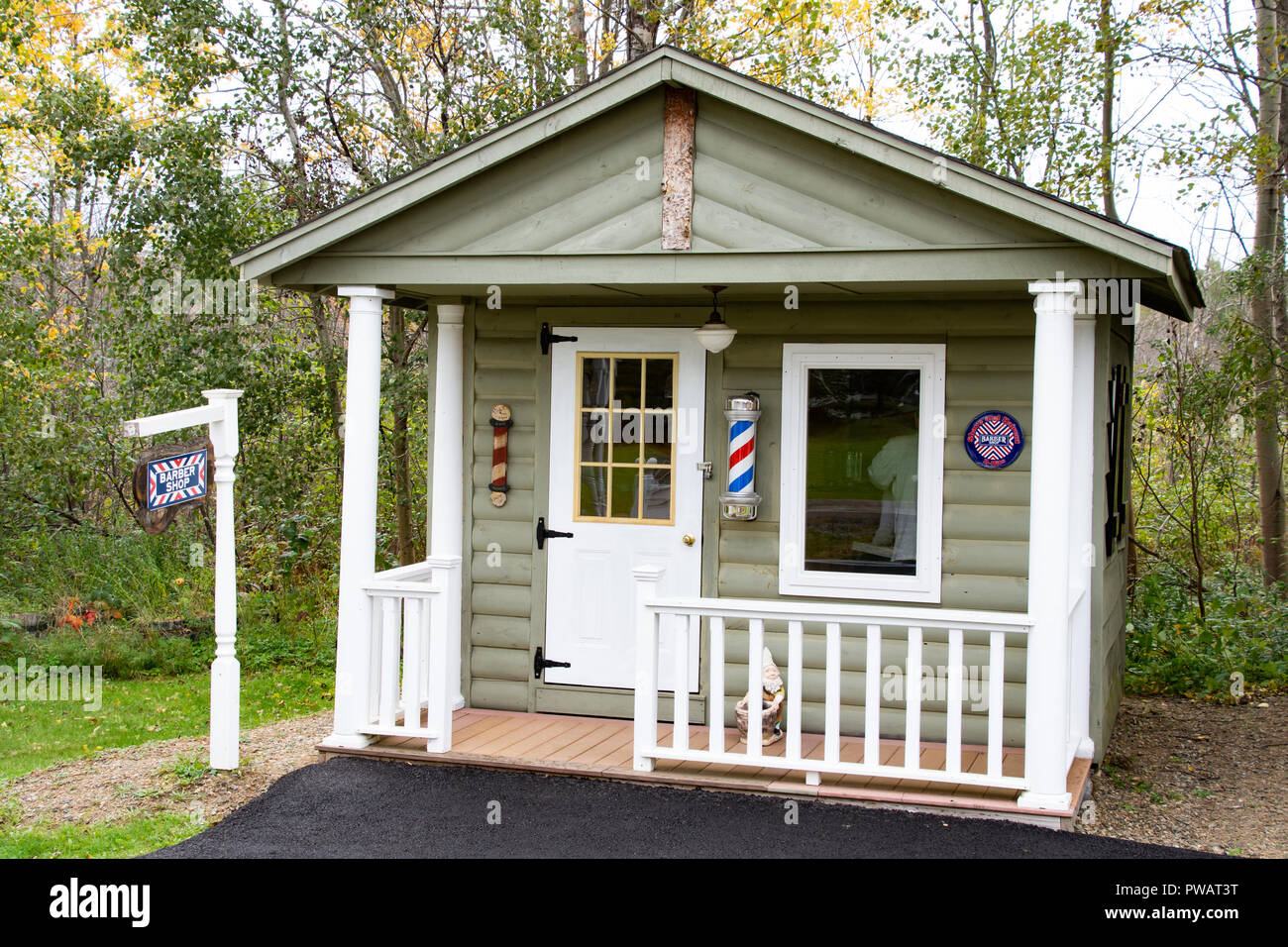 A miniature barber shop building, part of the Route 66 buildings on display in Speculator, NY USA donated by John Van-Buiten to the community. Stock Photo